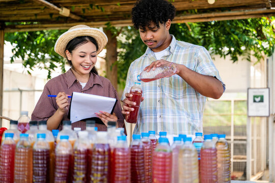 Agricultural students produce organic fertilizers, natural gardener compost tea prepared for agriculture with documenting biofertilizer production
