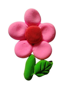 Simple pink playdough flower with green leaves detailed close up on a dark surface transparent background