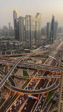 Highway traffic interchange in Dubai.  Dubai, United Arab Emirates aerial footage. Beautiful view of the Duabi skyline and infrastructure.