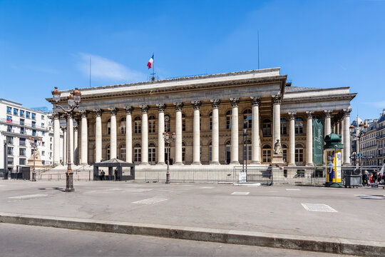 Paris, France - June 17, 2026: West side view of the Palais Brongniart, formerly Palais de la Bourse, built in 1826 to house the Paris stock exchange until 1998, and converted into an events center.