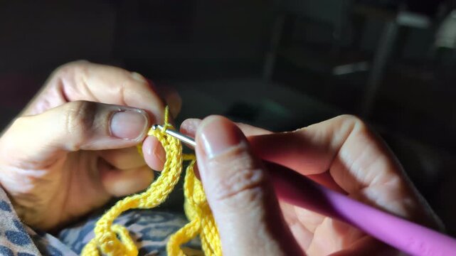 Close-up of hands doing the crochet