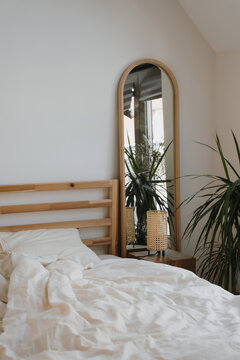 Interior Design Of Sunlit Attic Bedroom Through Open Door