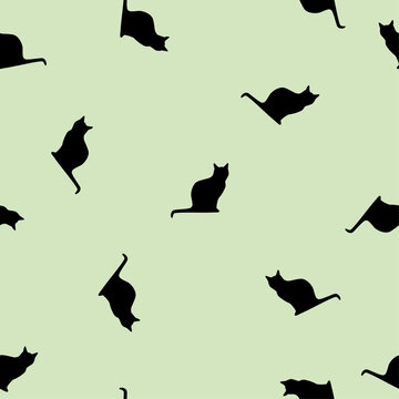 Seamless animals pattern black cats on green background, vector eps 10