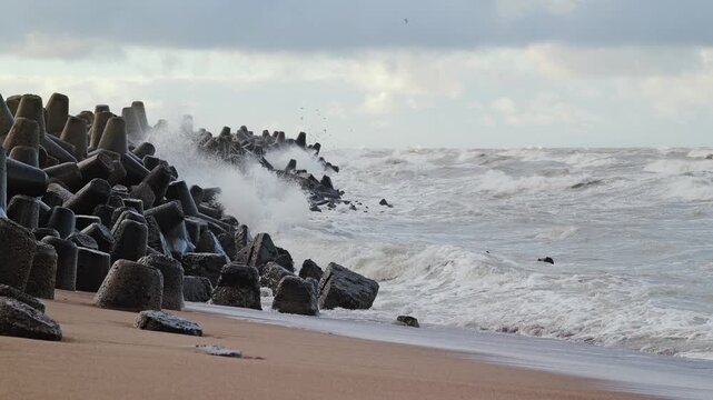 Powerful Baltic Sea waves crash against Liepaja Northern Breakwater in winter