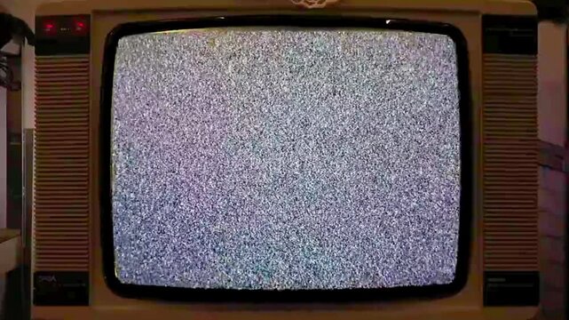 Vintage retro television screen with flickering white noise and analog static glitch effect