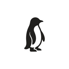 Fototapeta premium Penguin standing upright, minimal silhouette vector, black monocolor design, smooth rounded shapes, isolated white background