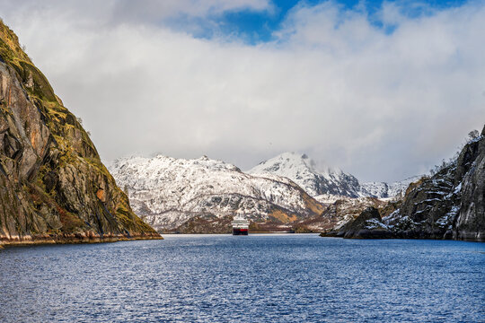 A small cruise ship at the exit of the Trollfjord in Norway