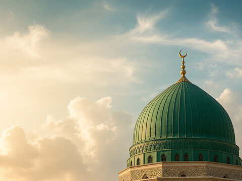 Green dome of sacred mosque at golden hour with clouds for peaceful religious background
