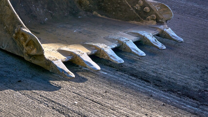 Industrial pause.Road work, repair.Excavator bulldozer bucket © Igor