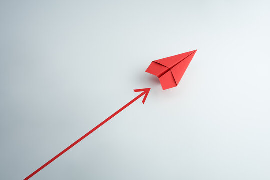 Red paper plane with arrow on white background, Business success, innovation and solution concept