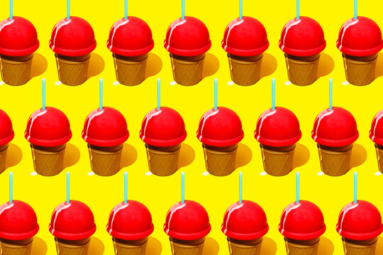 Red ice cream drinks with turquoise straws on yellow background