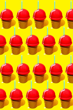 Repeating pattern of ice cream cone bottle on yellow background