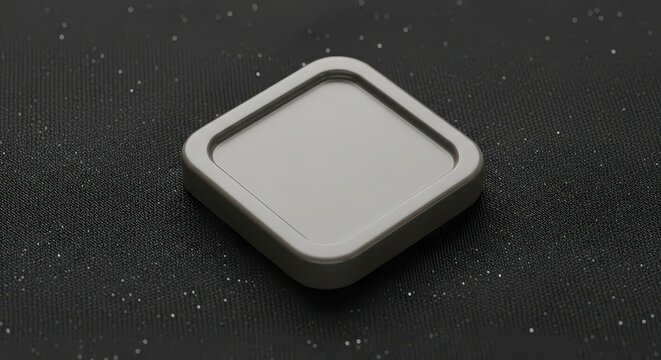 Gray square object on black background.