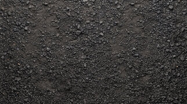 Flat lay texture of dark basalt rock ground