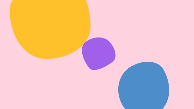 Abstract composition featuring three colorful circles on a soft pink background