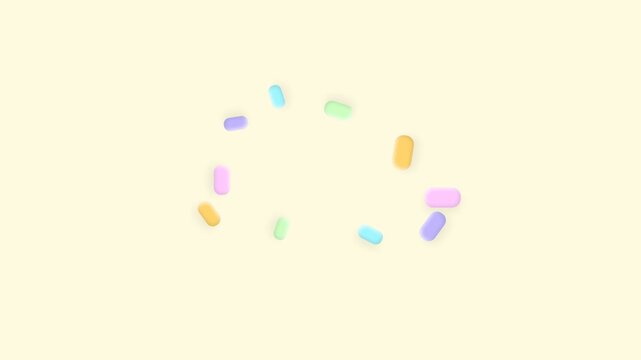 A circular arrangement of colorful pastel sprinkles on a soft white background