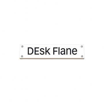 Desk Flane white name plate isolated on black background