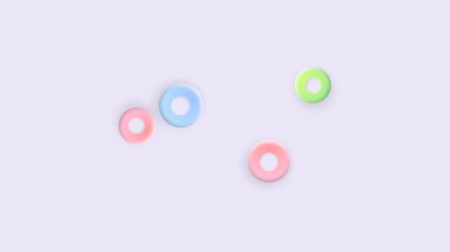 A collection of colorful pastel circular rings scattered on white background