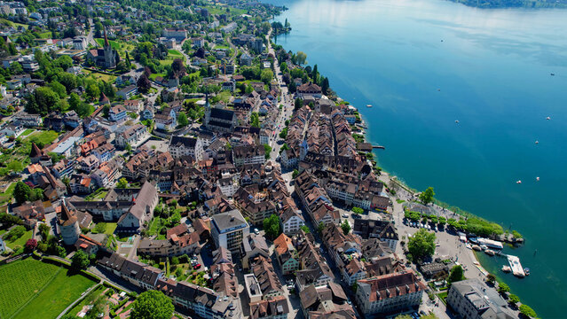 Aerial view around the old town of the city Zug, switzerland on a sunny spring noon.