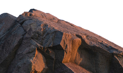 Large textured boulders with golden hour sunset lighting isolated on a transparent background. PNG file © Maria