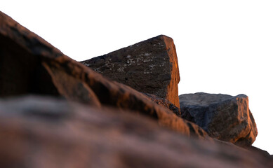 Large textured boulders with golden hour sunset lighting isolated on a transparent background. PNG file © Maria