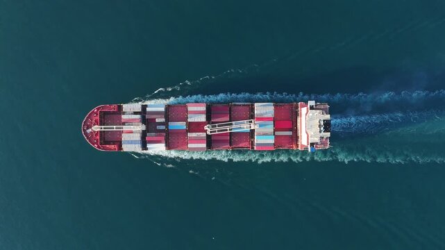 Cargo container Ship, cargo maritime ship with contrail in the ocean ship carrying container and running for export concept technology freight shipping sea freight by Express S