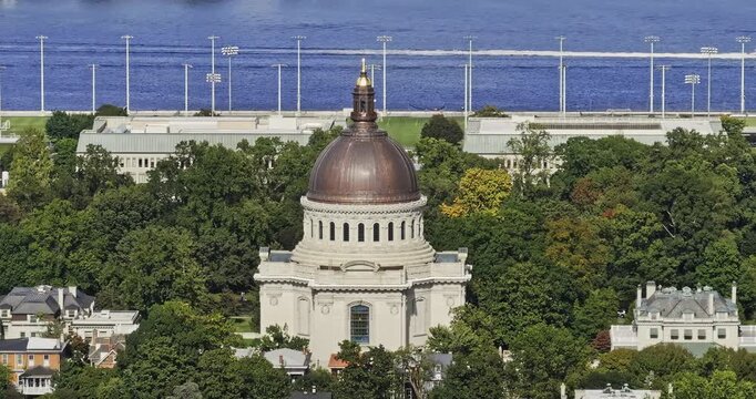 Annapolis Maryland Aerial v6 flyover town center capturing iconic dome of Naval Academy Chapel, nestled in lush greenery, against Severn River backdrop - Shot with Mavic 3 Pro Cine - September 2023