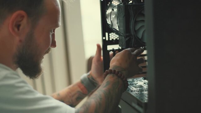 Building a computer from parts in a workshop with a focus on cables and components
