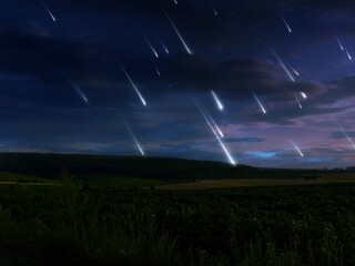 Meteorites in the evening sky over fields and forests. Meteor shower in the Earth's atmosphere. Flashes of bright shooting stars. © Nazarii