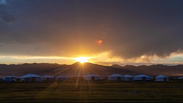 Sunset and yurts near the town of Khovd in Mongolia.