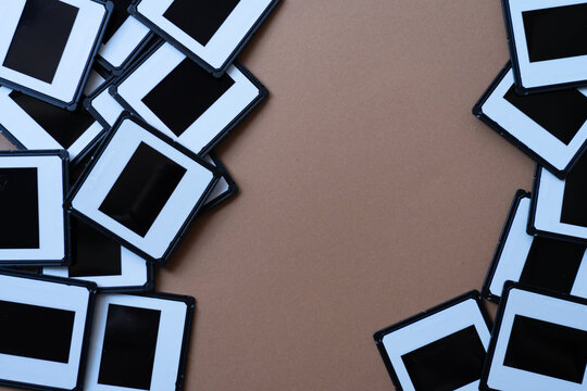 Old Photo Slides Frames on Brown Background with Space for Text