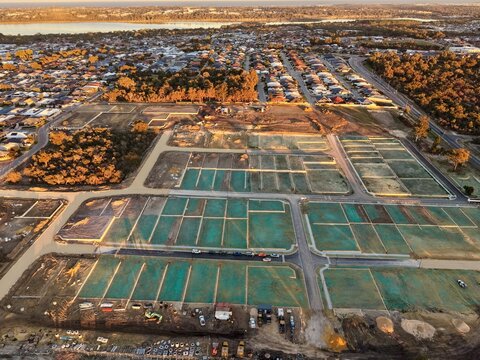 Aerial View of New Residential Subdivision with Hydroseeded Building Lots at Sunset in Western Australia