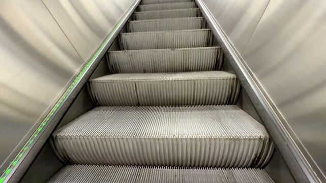 Empty Escalator Moving Upward Indoors