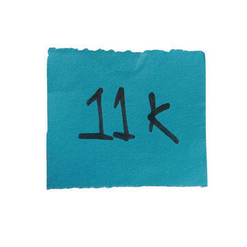 Blue square sticky note with 11k written in black marker ink