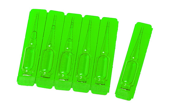 Green medical ampoules for treatment on transparent background