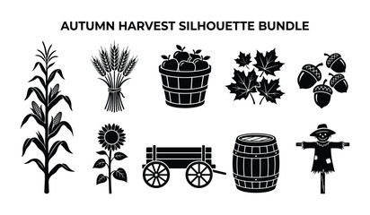Collection of autumn harvest silhouettes including corn wheat apples acorns leaves sunflower wagon barrel and scarecrow © MdJamil