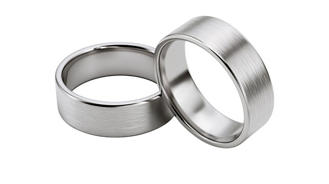 Two silver wedding bands with brushed finish on transparent background ring band jewelry metal engagement couple