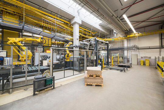 Factory shop floor, industrial robot