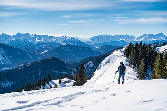 Germany, Bavaria, Brauneck, man on a ski tour in winter in the mountains