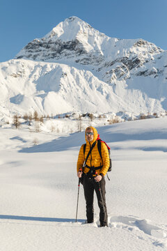 Hiking with snowshoes in the mountains, Valmalenco, Sondrio, Italy