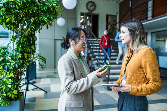 Teamwork and communication in a modern coworking office environment