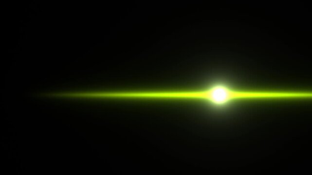 Bright green light beam moving through black background