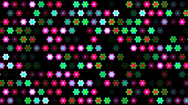 Colorful flower patterns moving on a dark background