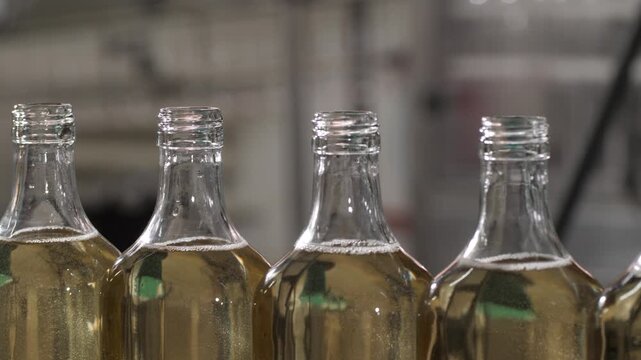 White wine bottling production line at a winery facility