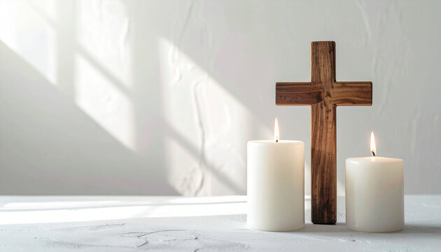 Wooden cross and white candles, serene Christian religious scene, quiet contemplative atmosphere, white plaster backdrop. Close-up.