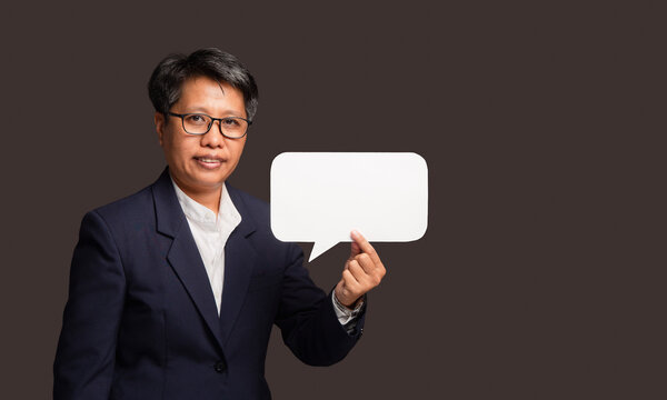 Mature Woman Holding Blank Speech Bubble Sign
