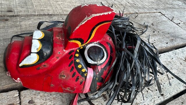 Handcrafted Traditional Red Wooden Mask from Indonesia