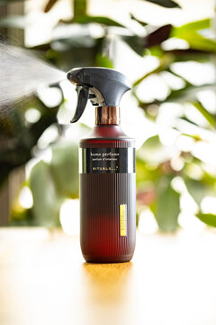 Rituals home perfume spray releasing fragrance mist indoors &ndash; editorial product photograph