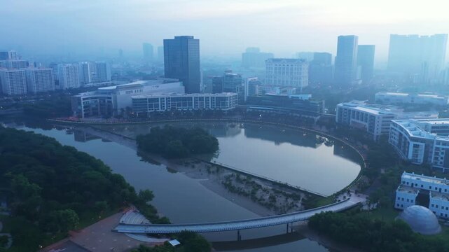 A beautiful high-angle drone dolly out shot starting from a close-up and smoothly widening to a panoramic view of the iconic Starlight Bridge (Cau Anh Sao) in District 7, Ho Chi Minh City.