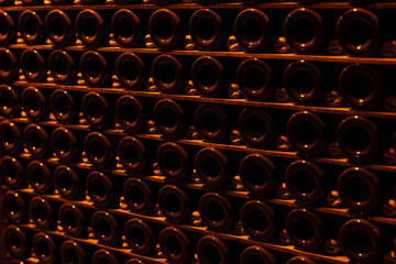 Obraz premium Wall of champagne bottles aging in a cellar